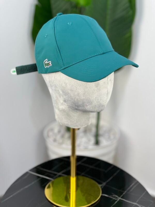 Casquette Lacoste coté (bleu vert)